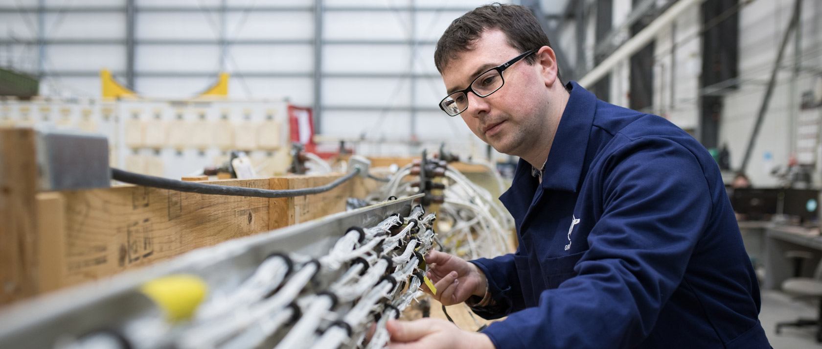 Aircraft engineer working on a piece of equipment